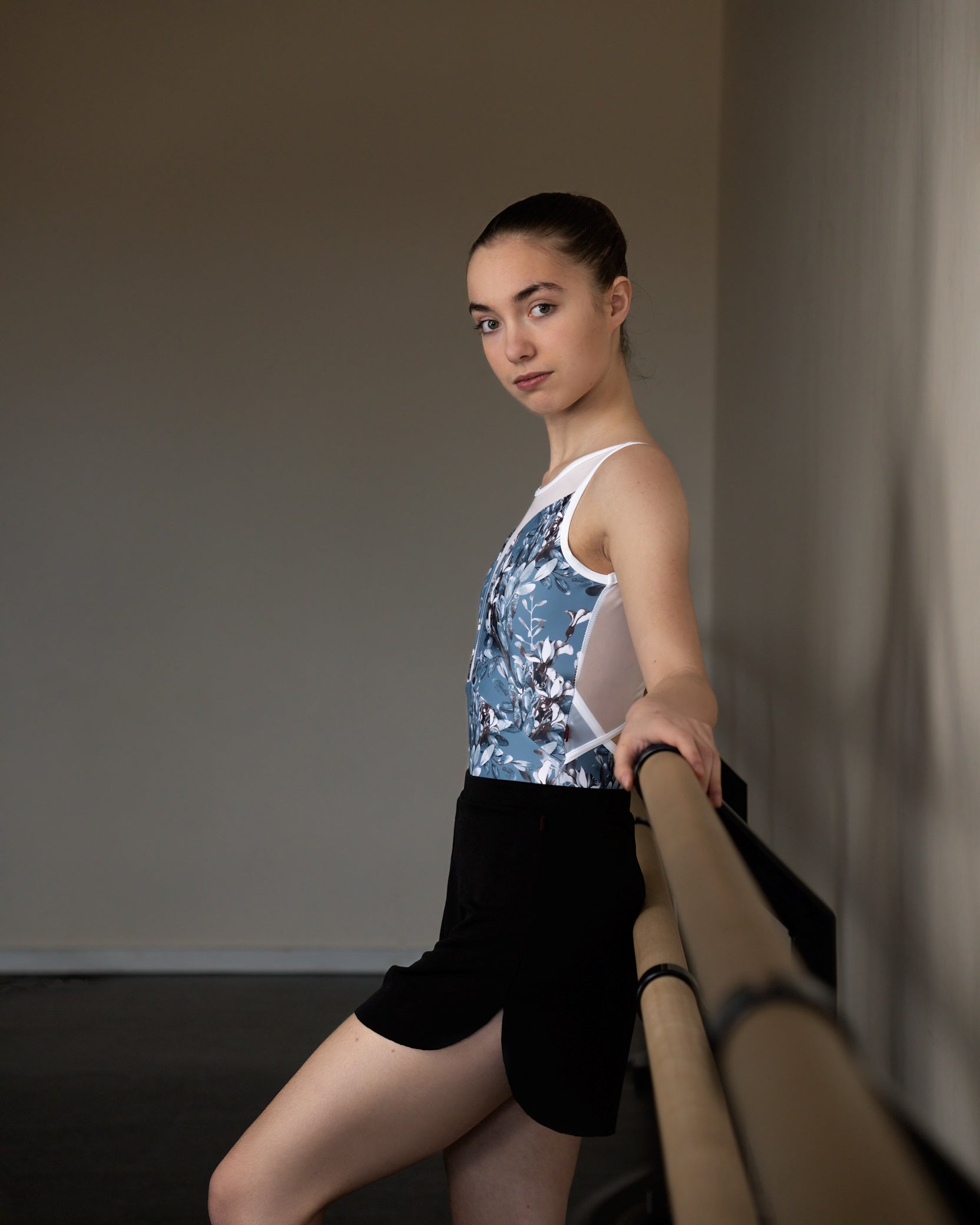 Black slinky dance shorts . Dancer wearing shorts with leotard.