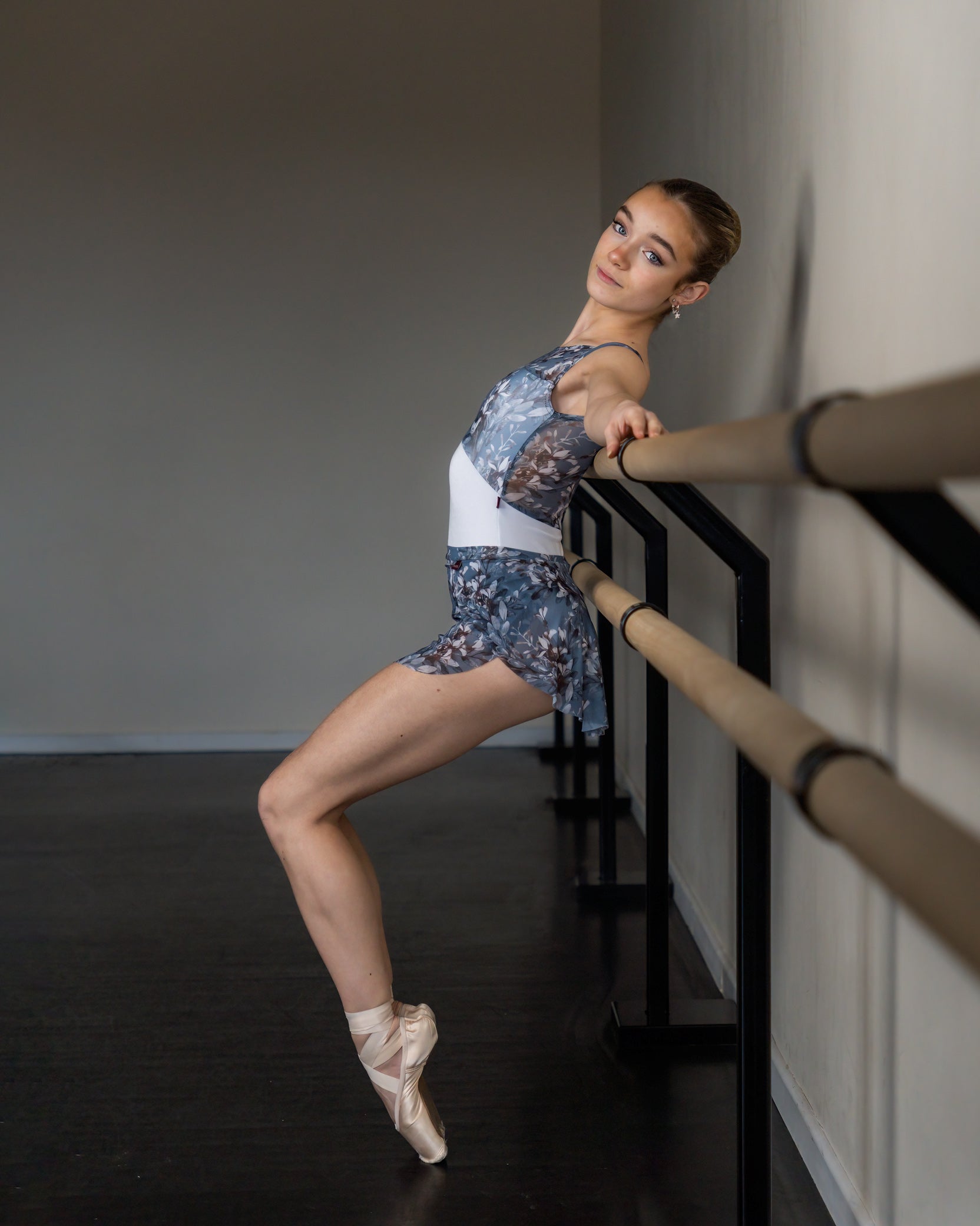 Dancer wearing a blue floral mesh SAB ballet skirt.