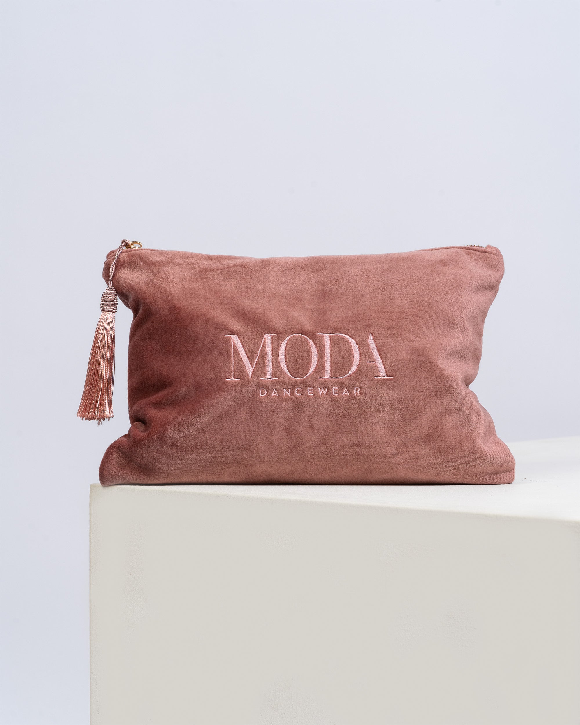 Velvet dusky pink Dancer accessory bag with matching tassel and logo embroidery