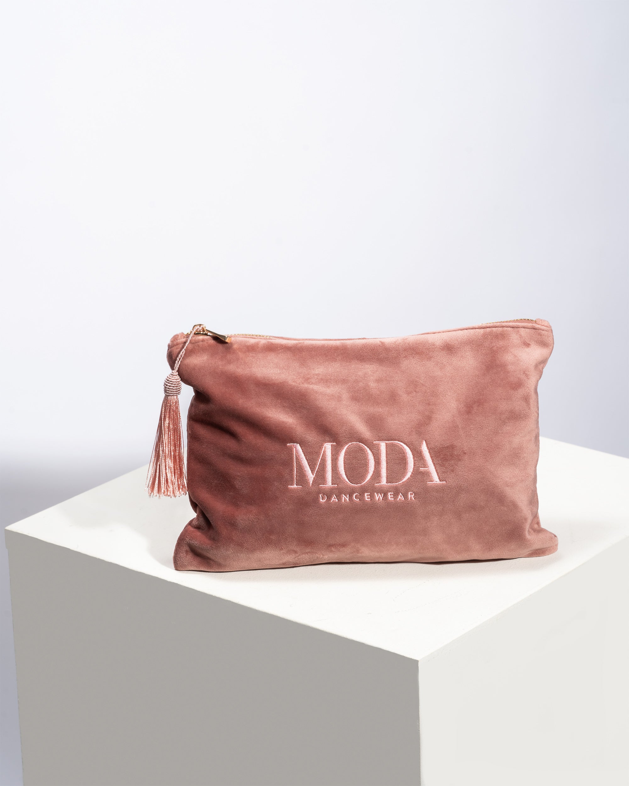 Velvet dusky pink Dancer accessory bag with matching tassel and logo embroidery