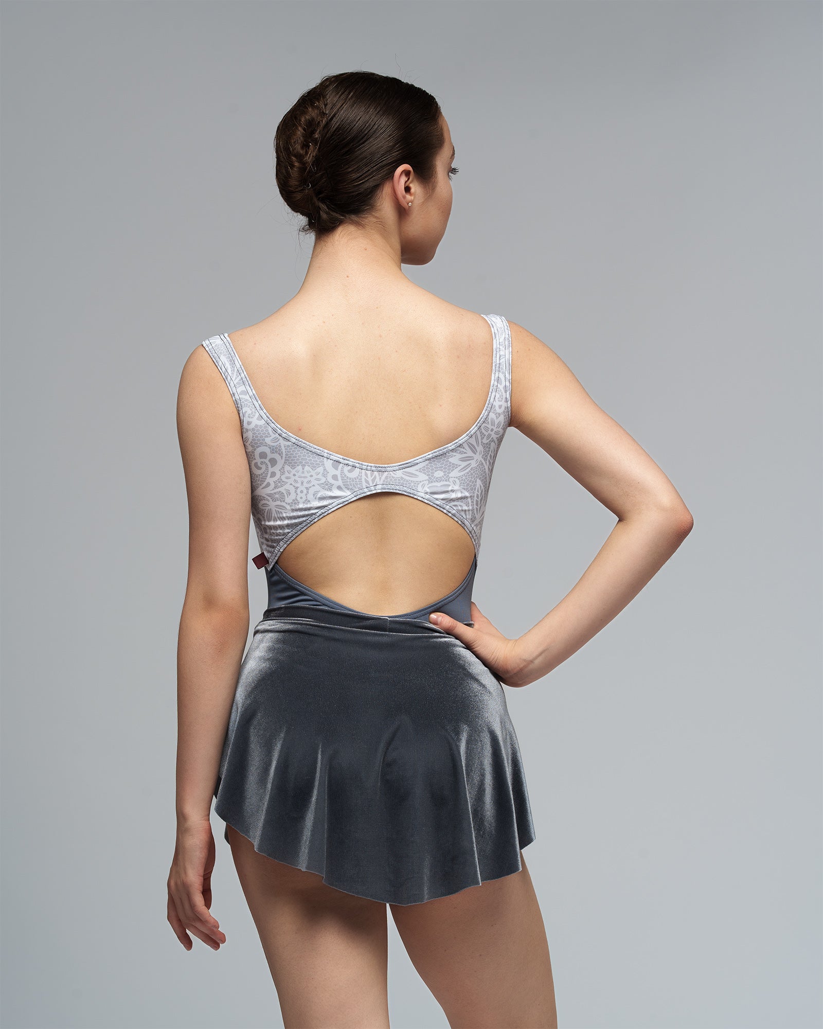 Dancer wearing grey velvet SAB skirt