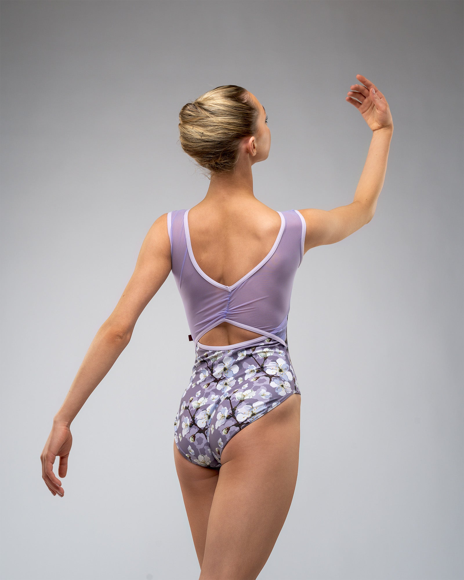 Ballet Dancer, wearing ladies, lilac, floral purple mesh leotard